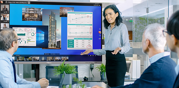 Meeting being conducted using an Optoma IFPD and Vizetto Reactiv SUITE